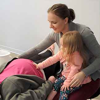 Adel Adult Chiropractic Patient Lying on Back